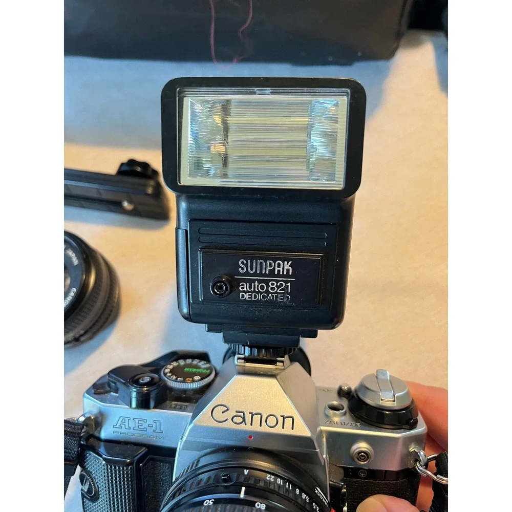 Canon AE-1 Program 35mm SLR Film‎ Camera Bundle with 50mm Lens Flash and Bag